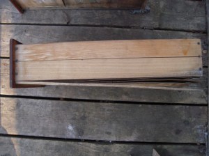 Willy Nilly oak sides.  Probably a way of using scrap economically in the production of the boat.