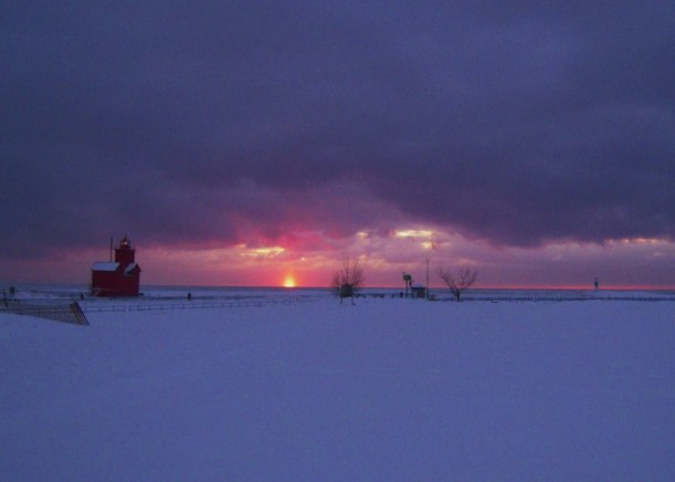 The Sun going down under Lake Michigan snow bands.